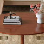 wooden coffee table with faux rattan accents