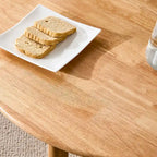 wooden coffee table with faux rattan accents